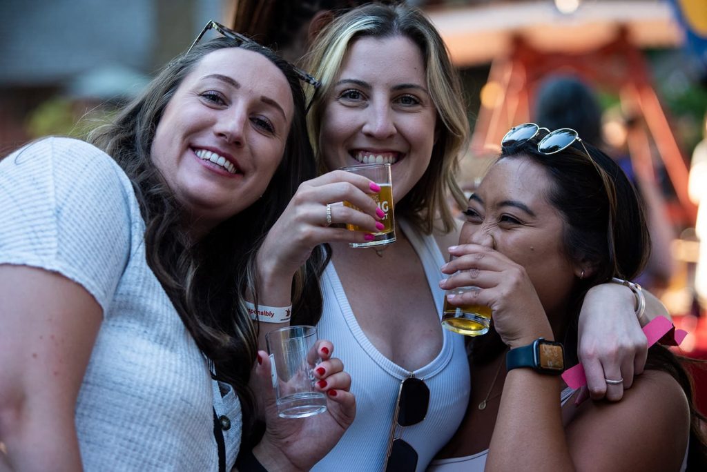 Girls smiling and posing in a good photograph. Central Texas. 
